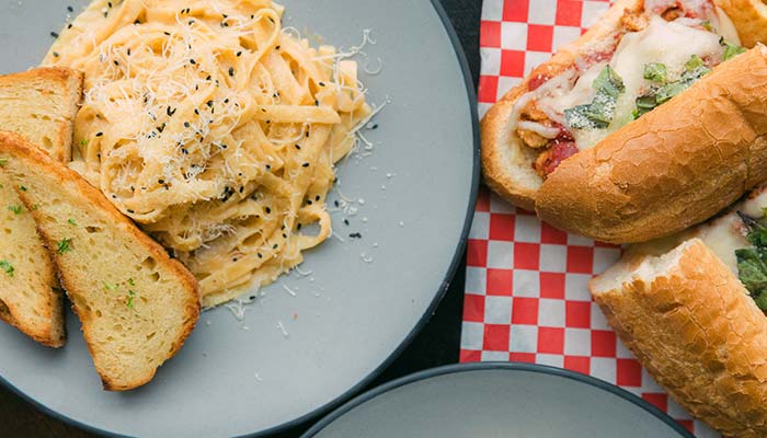 Food menu authentic Italian pasta alfredo and sandwiches served Drunken Elephant Pizza & Brews restaurant, pizzeria and bar in Temecula, CA Food menu authentic Italian pasta alfredo and sandwiches served Drunken Elephant Pizza & Brews restaurant, pizzeria and bar in Temecula, CA